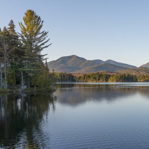Boreas Ponds in the Adirondacks on a glassy lake with Mount Marcy and the high peaks in the background (iStock)